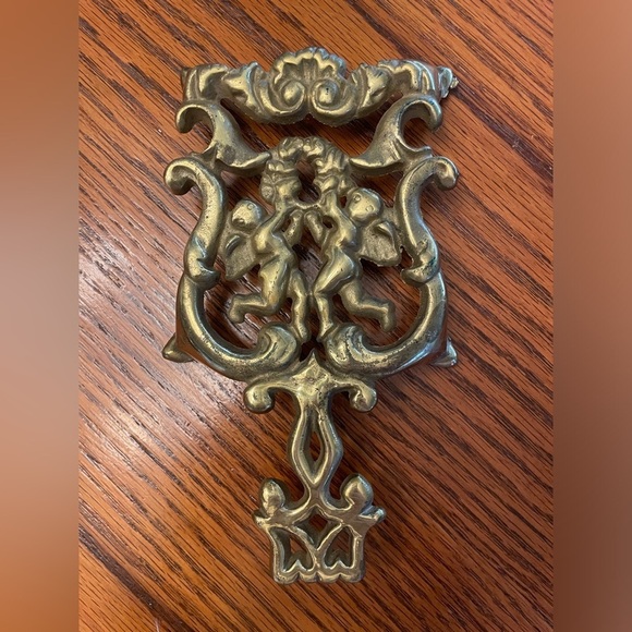 Vintage Gold Cherubs Cupids Scrolls Footed Trivet Cast Iron 8" L X 4.5" W - Picture 1 of 9